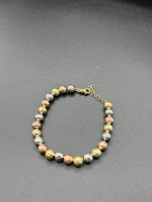 Pulsera tricolor de plata.
