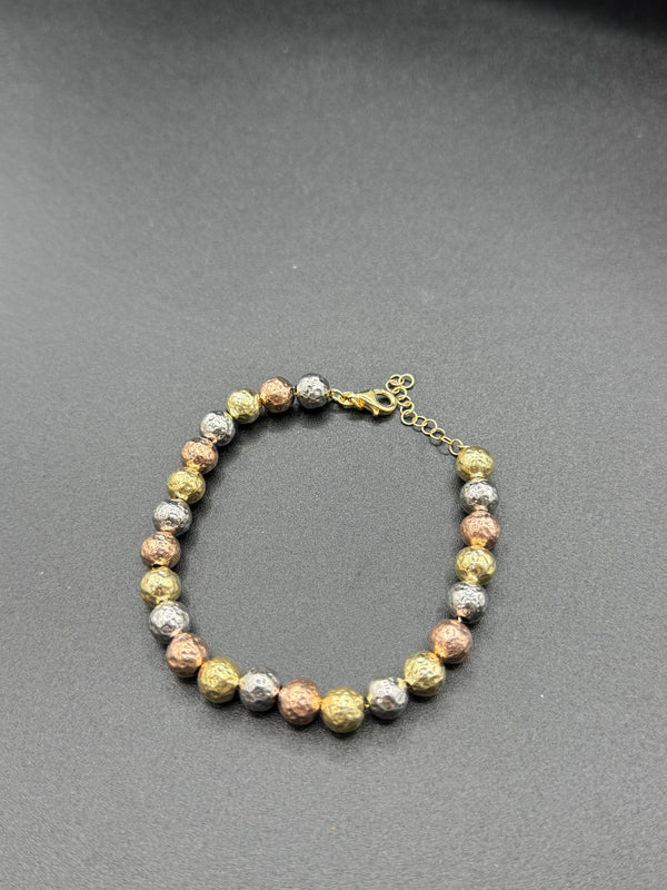 Pulsera tricolor de plata.