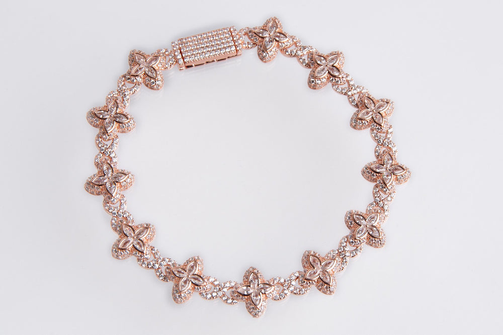 Pulsera de flores blancas rosa