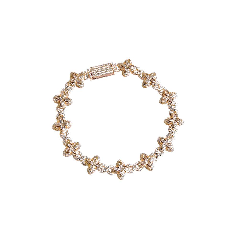 Pulsera de flores blancas chapada