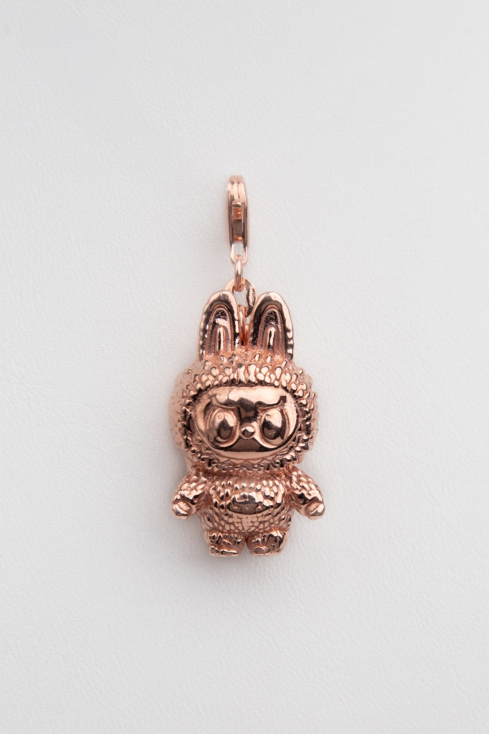 Colgante muñeco rosa