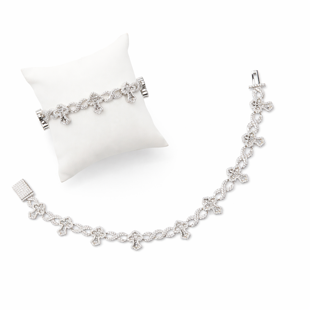 Pulsera de cruces con piedras blancas